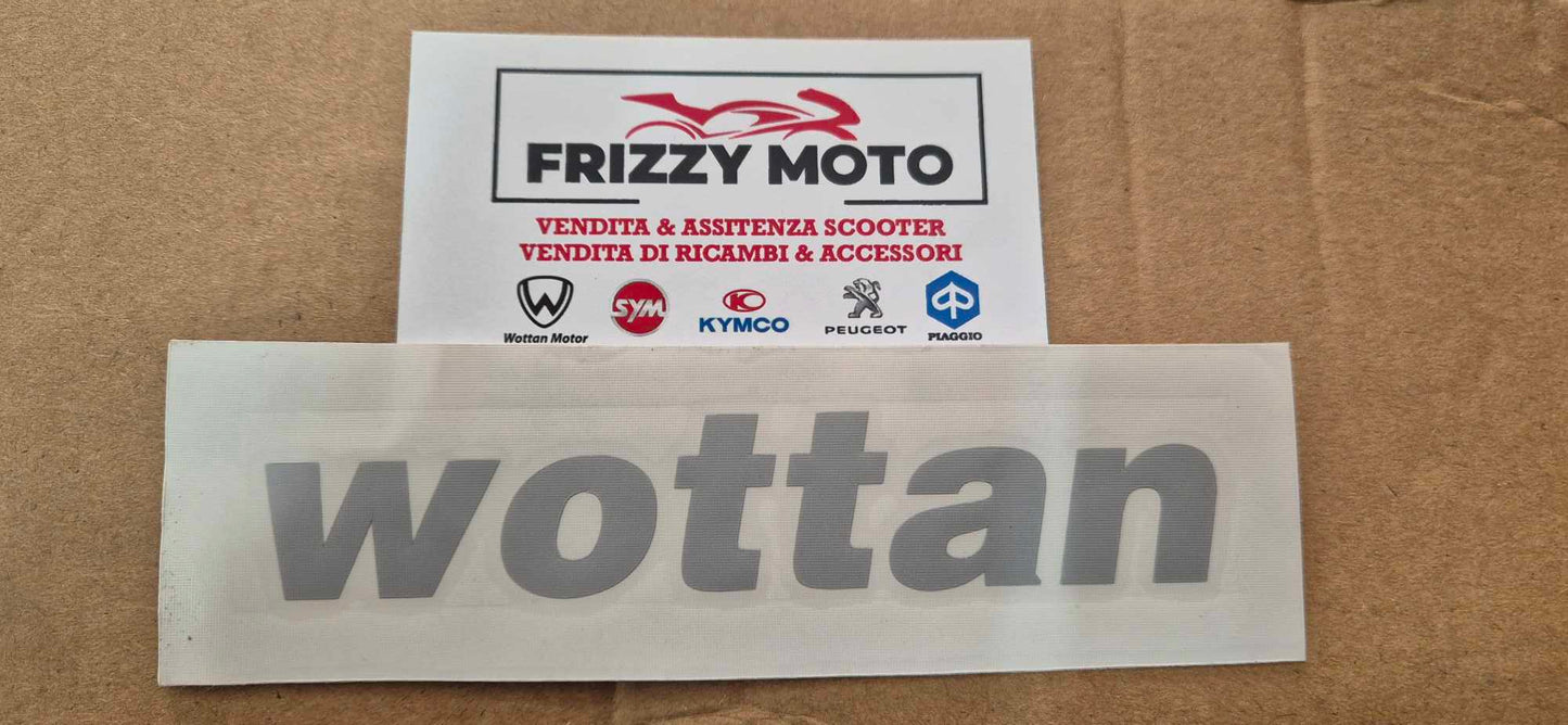 EMBLEMA WOTTAN ADESIVO